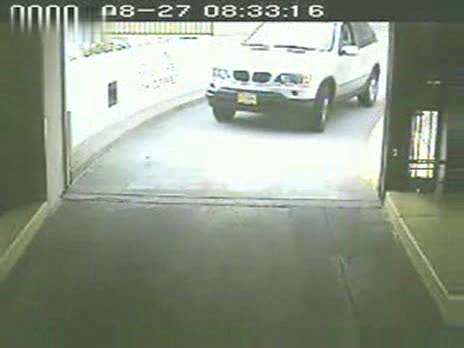 Woman Rams Parking Garage Door